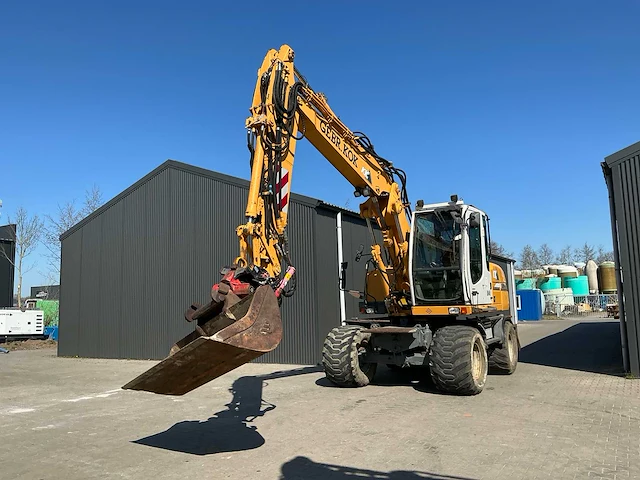 Liebherr a314 litronic banden graafmachine / mobiele kraan - afbeelding 7 van  58