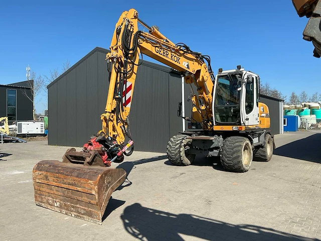 Liebherr a314 litronic banden graafmachine / mobiele kraan - afbeelding 1 van  58