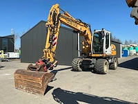Liebherr a314 litronic banden graafmachine / mobiele kraan - afbeelding 1 van  58