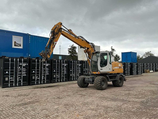 Liebherr a314 litronic banden graafmachine - afbeelding 17 van  54