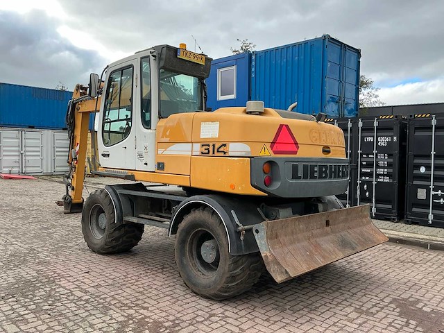 Liebherr a314 litronic banden graafmachine - afbeelding 12 van  54