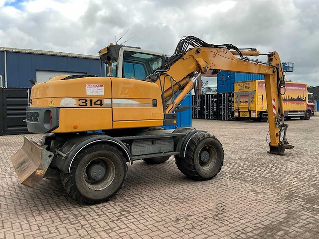 Liebherr a314 litronic banden graafmachine - afbeelding 51 van  54