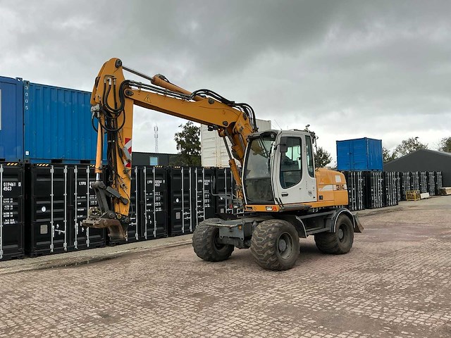 Liebherr a314 litronic banden graafmachine - afbeelding 54 van  54