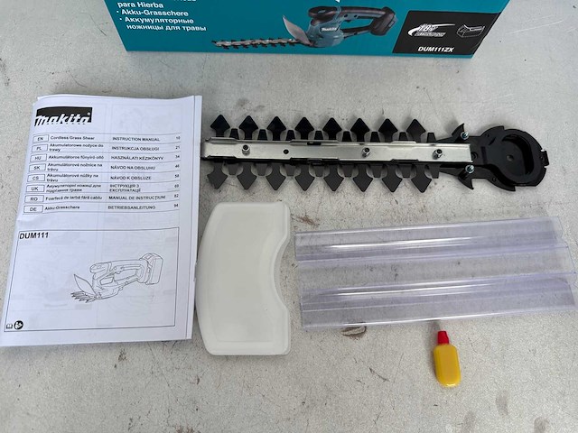 Makita dum111zx accu gras-/buxusschaar 18v basic body - afbeelding 4 van  4