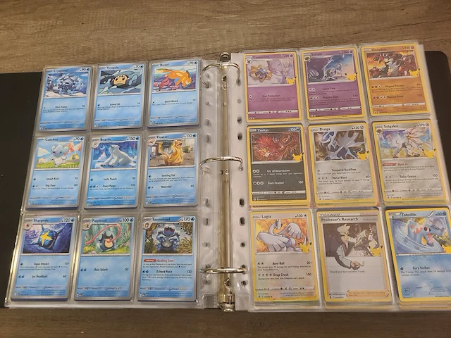 Map vol met (zeldzame) pokémonkaarten + gevulde pokémon tins - afbeelding 5 van  41