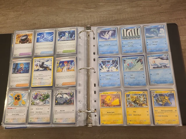 Map vol met (zeldzame) pokémonkaarten + gevulde pokémon tins - afbeelding 17 van  41