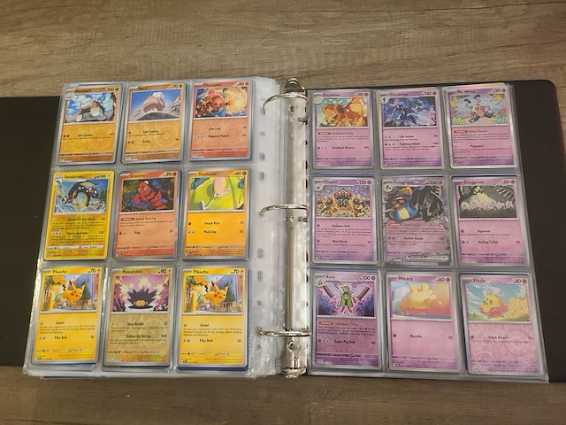 Map vol met (zeldzame) pokémonkaarten + gevulde pokémon tins - afbeelding 32 van  41