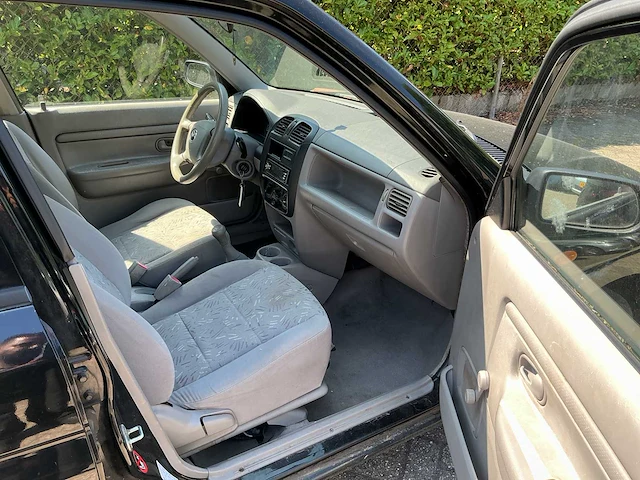 Mazda - demio - 1.3 comfort - personenauto - afbeelding 12 van  12