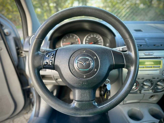 Mazda 2 1.4 exclusive, 42-pp-gd - afbeelding 11 van  14