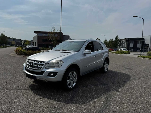 Mercedes - 2009 - ml - 320 cdi 4matic - duits - afbeelding 1 van  12