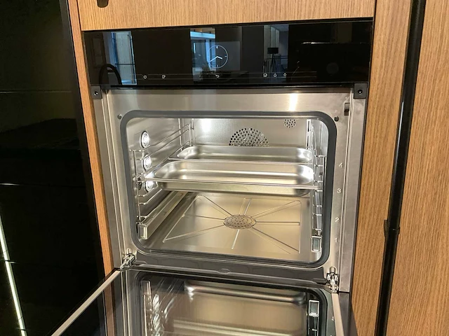 Mk 2585 zera ver sy eiland showroomkeuken met hoge kastenwand - afbeelding 26 van  33