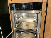 Mk 2585 zera ver sy eiland showroomkeuken met hoge kastenwand - afbeelding 26 van  33