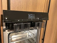 Mk 2585 zera ver sy eiland showroomkeuken met hoge kastenwand - afbeelding 27 van  33