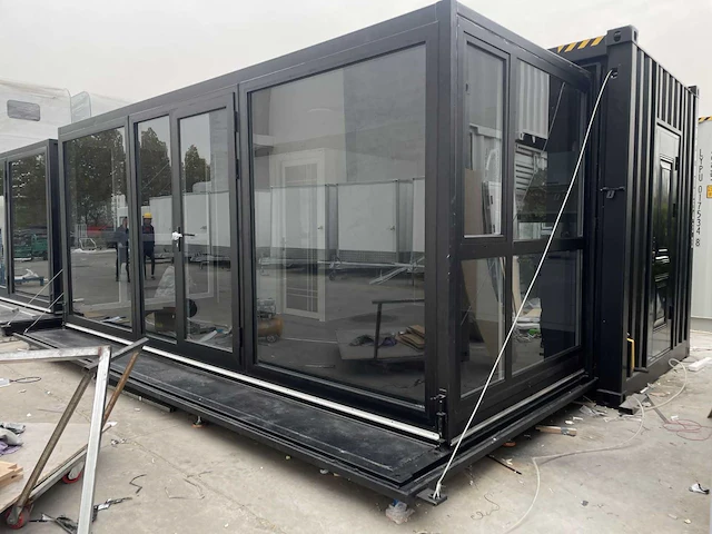 Mobiele containerwoning / woonunit met badkamer en keuken 20ft - afbeelding 1 van  19
