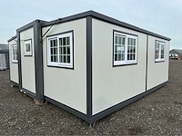 Mobiele woonunit / tiny house met twee slaapkamers en keuken - afbeelding 2 van  68