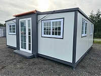 Mobiele woonunit / tiny house met twee slaapkamers en keuken