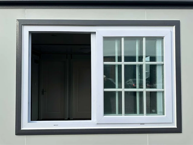 Mobiele woonunit / tiny house met twee slaapkamers en keuken - afbeelding 13 van  70