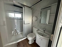 Mobiele woonunit / tiny house met twee slaapkamers en keuken - afbeelding 47 van  70