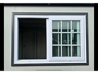 Mobiele woonunit / tiny house met twee slaapkamers en keuken - afbeelding 2 van  68