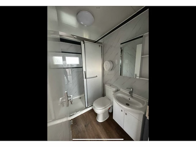 Mobiele woonunit / tiny house met twee slaapkamers en keuken - afbeelding 25 van  68