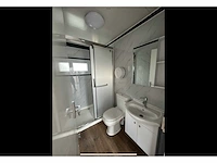 Mobiele woonunit / tiny house met twee slaapkamers en keuken - afbeelding 25 van  68