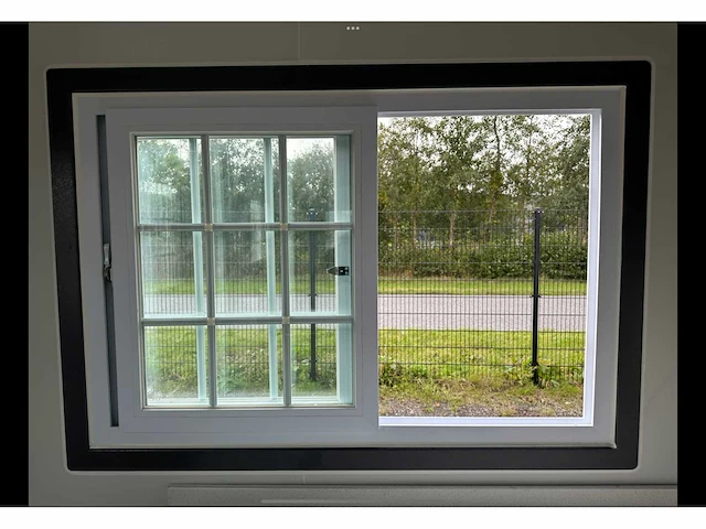 Mobiele woonunit / tiny house met twee slaapkamers en keuken - afbeelding 30 van  68