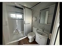 Mobiele woonunit / tiny house met twee slaapkamers en keuken - afbeelding 35 van  68