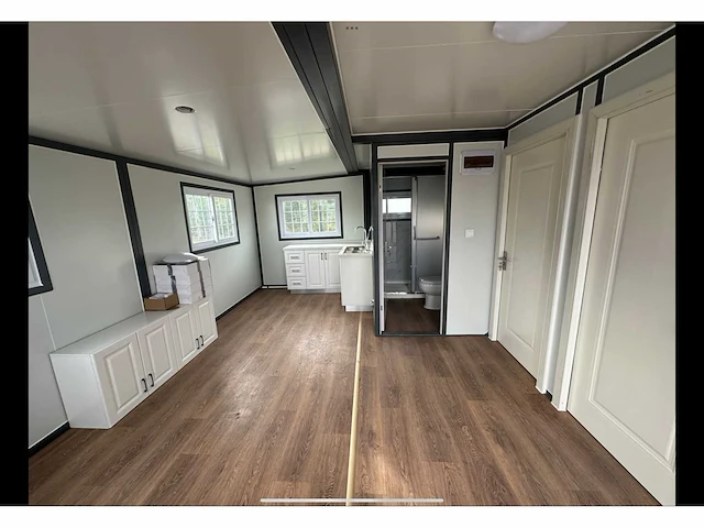Mobiele woonunit / tiny house met twee slaapkamers en keuken - afbeelding 61 van  68