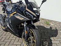 Motor, trmotor, tr125-2 gp1, zwart/goud, 2025 - afbeelding 14 van  20