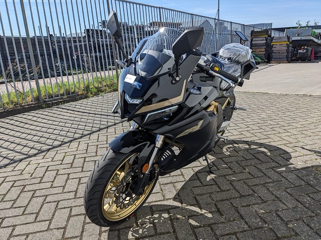 Motor, trmotor, tr125-2 gp1, zwart/goud, 2025 - afbeelding 15 van  20
