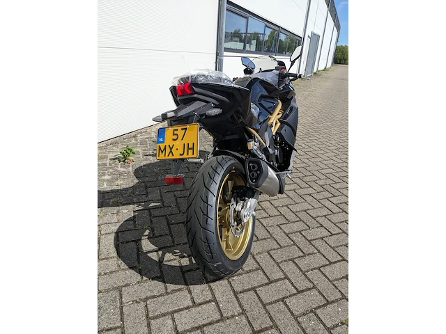 Motor, trmotor, tr125-2 gp1, zwart/goud, 2025 - afbeelding 18 van  20