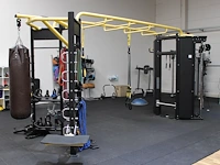 Multistation impuls met diverse accessoires w.o. bokszak, dumbbells en touw