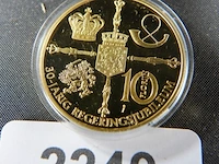 Munt in plastic houder - afbeelding 1 van  3