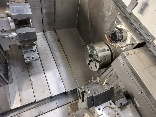 Nakamura-tome wt-300 gr-210new cncdraaibank met stafaanvoerinrichting en multi layer work stocker - afbeelding 16 van  40