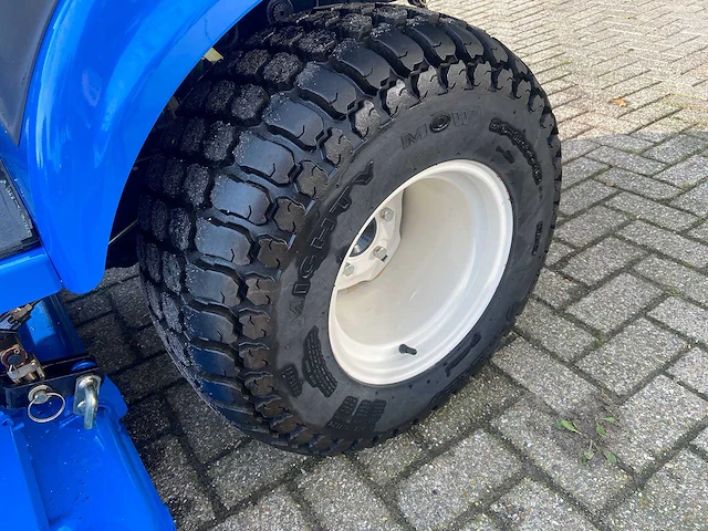 New holland - tz24d - mini tractor met maaidek - 2008 - afbeelding 6 van  24