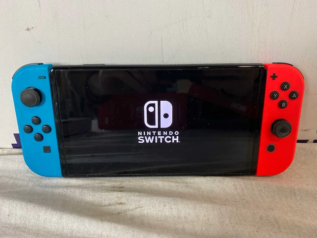 Nintendo switch oled - blauw/rood - afbeelding 4 van  6