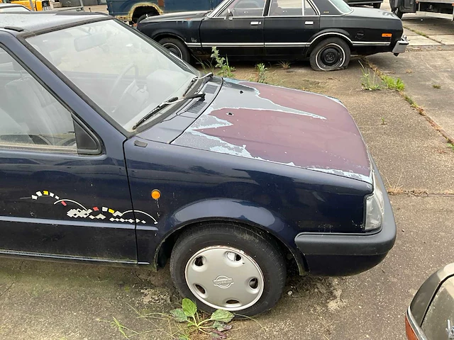 Nissan micra personenauto - afbeelding 14 van  16