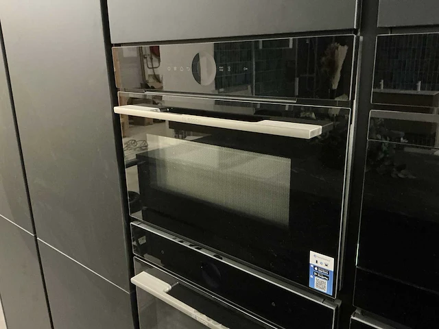 Nobilia showroom eilandkeuken met apparatenwand - afbeelding 35 van  47