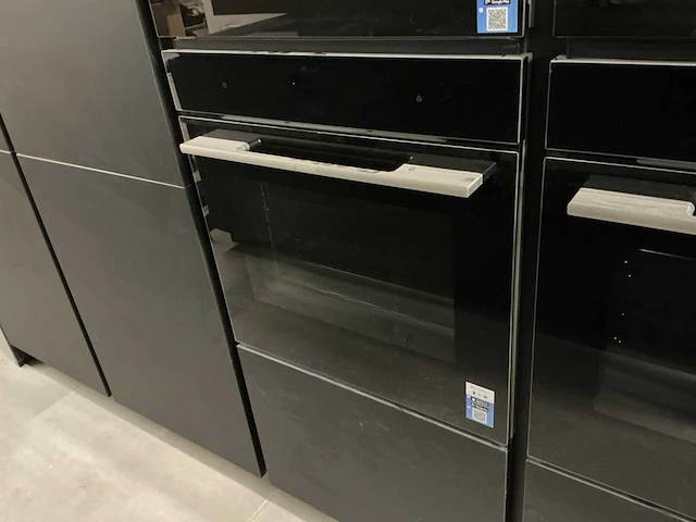 Nobilia showroom eilandkeuken met apparatenwand - afbeelding 38 van  47