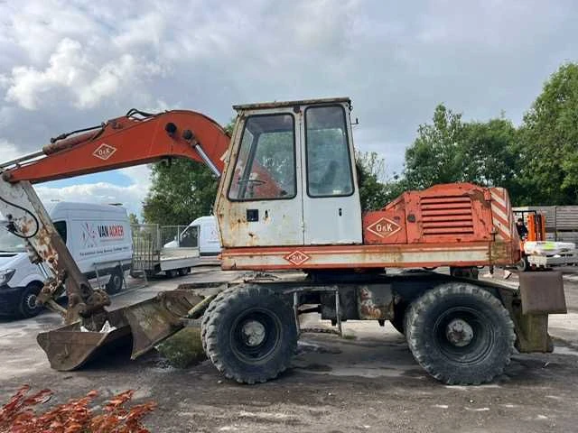 O&k - 1985 - mh4ga2 - banden graafmachine - afbeelding 1 van  5