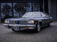 Oldtimer personenauto, oldsmobile, delta 88 royale, 1974 - afbeelding 1 van  41