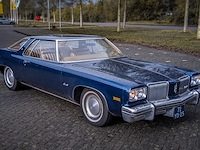 Oldtimer personenauto, oldsmobile, delta 88 royale, 1974 - afbeelding 34 van  41