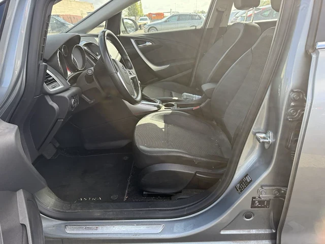 Opel astra sports sedan1 6i cosmo 115 at,2013 - afbeelding 26 van  27