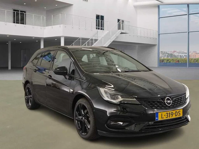 Opel astra sports tourer 1.2 ultimate ; l-319-ds - afbeelding 12 van  19
