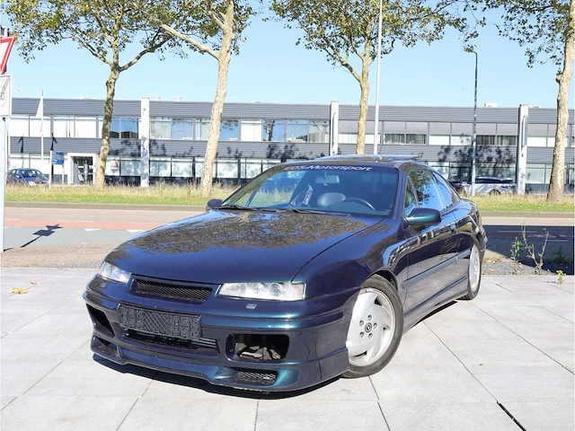 Opel calibra 2.0 turbo 4x4 330pk 1993 - afbeelding 1 van  23