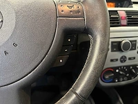 Opel corsa 1.2-16v silverline 60-sz-rs - afbeelding 12 van  21