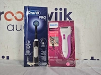 Oral-b pro series 1 - zwarte - elektrische tandenborstel - ontworpen door braun + philips satinshave essential hp6341/00 - ladyshave voor vrouwen - roze - afbeelding 2 van  2