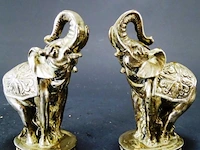 Paar met zilver opgelegde olifanten