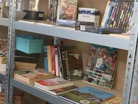 Partij diversen in stelling o.a. dvd's, boeken & puzzel - afbeelding 1 van  7