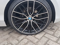Personenauto bmw, 1-serie 114i, wit, bouwjaar 2013 - afbeelding 19 van  31
